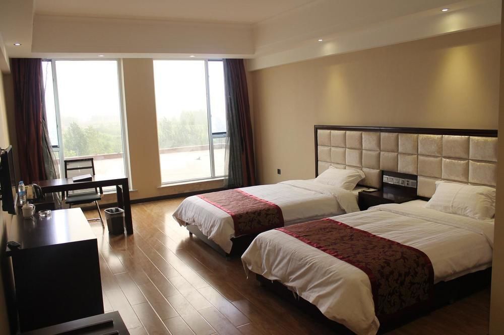 Weishi International Hotel Qingzhou Экстерьер фото